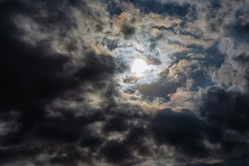 Rays of light shining throug dark clouds