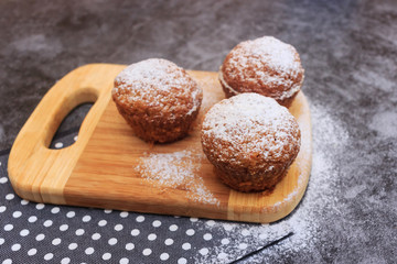Different colorful macaroons on gray background. Baking on a gray