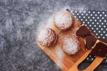 Different colorful macaroons on gray background. Baking on a gray