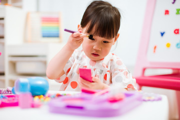 toddler girl pretend play make up at home