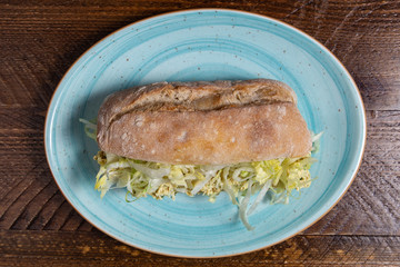 Sandwich with chicken meat.
