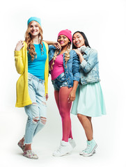 Fototapeta premium diverse nation girls group, teenage friends company cheerful having fun, happy smiling, cute posing isolated on white background, lifestyle people concept