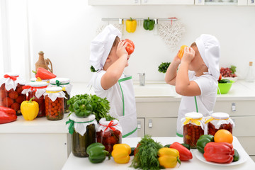 children in the kitchen help prepare food