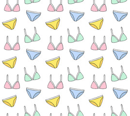 Vector seamless pattern of colored hand drawn doodle sketch female swim suit bikini isolated on white background