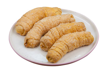 Tasty crispy fresh cookies on a plate on a White background
