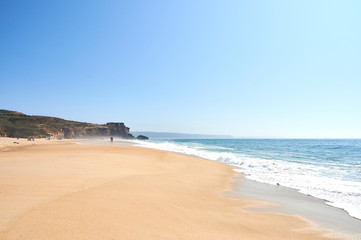 View over the beach of Norte with the clif and the fortress at the end
