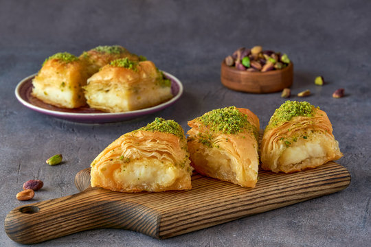 Sweets arabic dessert kunefe, kunafa, kadayif with pistachio and cheese