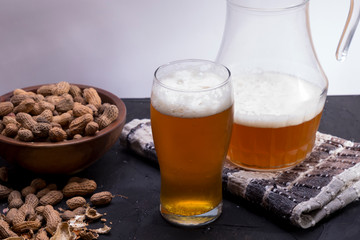 Very cold craft beer glass with foam.