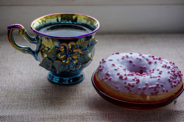 cup of coffee and donuts