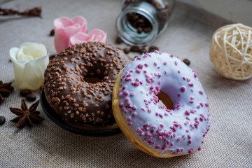 chocolate donuts with icing sugar