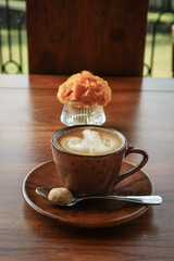 A cup of coffee with latte art on top