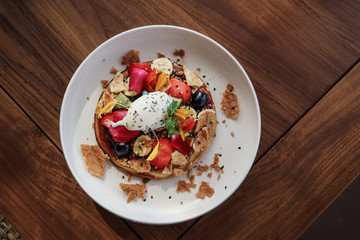 Pancakes with banana, kiwi, strawberries and ice cream