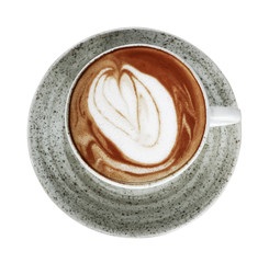 A cup of coffee with latte art on top