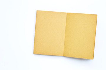 Opened empty book isolated on white background.