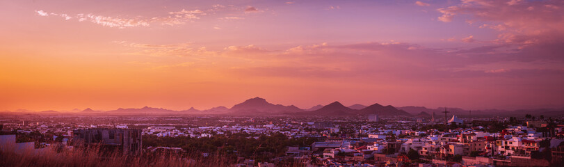 Panoramic photo of a sunset over the mountains
