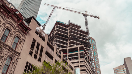 Construction and cranes on buildings in downtown Houston, Texas