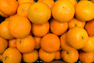 Top view of tasty oranges freshly collected on