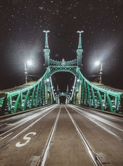 Fototapeta na wymiar Liberty Bridge over the river at night, Budapest, Hungary