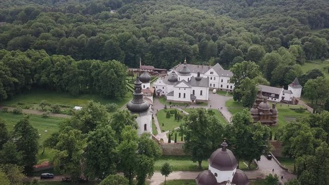 Krehiv monastery surrounded by a peaceful forest, shot wit a drone in 4K. Lviv, Zhovkva region, Galychyna, Ukraine