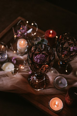 Still life of wedding decorations, candles and wine