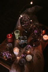 Still life of wedding decorations, candles and wine