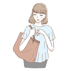 バッグから取り出す女性