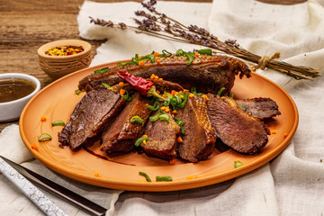 Roasted duck breasts, spices and Demi-glace sauce. Traditional French food