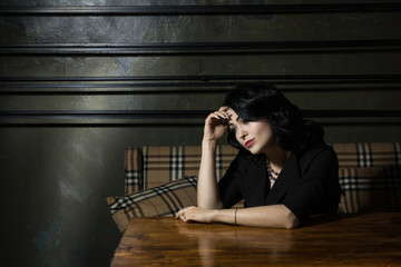 Gorgeous vintage 1950s lady with in a black dress....