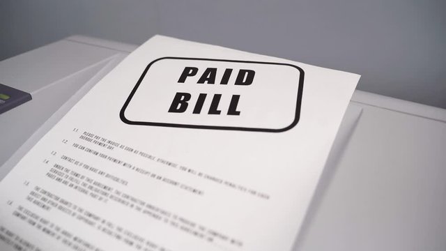 Notice to pay the bill. Debts comes by Fax. Printer prints the bill. Concept of bankruptcy