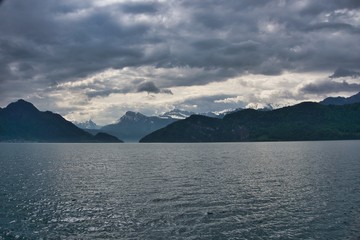 Scenic view of snow covered Alps mountains from Lake Lucerne in Luzern, Switzerland