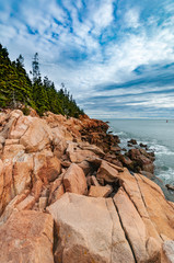 Fototapeta premium Rocks on the sea shore in Bar Harbor, Maine, Acadia National Park