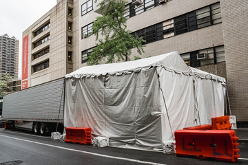 Hospitals in New York City. Morgue on Manhattan New York City streets near the hospitals for Covid patients. Dead people storage. 