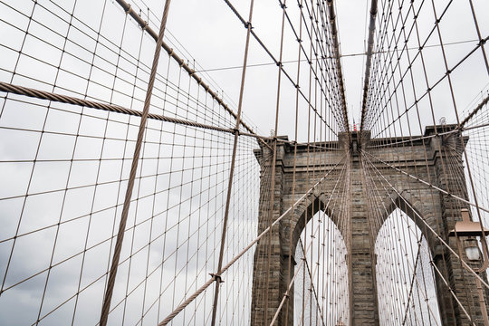 Fototapeta Brooklyn bridge. Rainy Brooklyn bridge view. Brooklyn bridge close up view. Rainy day at Brooklyn bridge. 