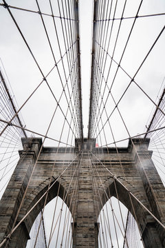 Brooklyn bridge. Rainy Brooklyn bridge view. Brooklyn bridge close up view. Rainy day at Brooklyn bridge. 