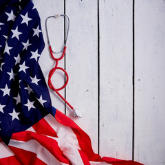 American Flag With Stethoscope On Table