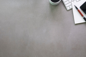 Top view office stuff with notepad, laptop and coffee cup mouse notepad shot.blank screen mobile...