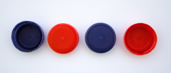 Plastic bottle caps. Four different bottle caps.