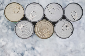 non-perishable pantry food, group of bean cans shot from top down persective