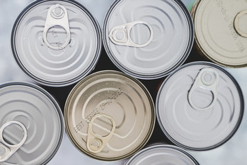 non-perishable pantry food, group of bean cans shot from top down persective