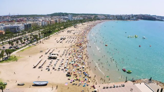 Endless multi-kilometer beach of Salou with a quadrocopter. The best place to stay for tourists from all over the world.