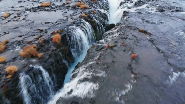 Aerial of a big Waterfall from a big river with cyan water - Ulysse Tassin Winter Iceland Drone 35/38