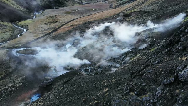 Aerial of Volcano Fumarole and Thermal Water Stream below - Ulysse Tassin Winter Iceland Drone 21/38