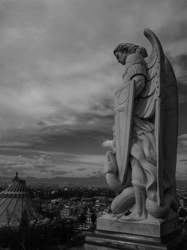 Statue And Basilica Of Our Lady Of Guadalupe