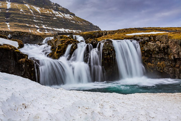 Various cascades make up Kirkjufellsfoss waterfall in Iceland