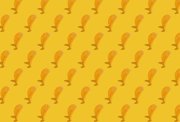 Crispy chips on a yellow background. Modern Food pattern