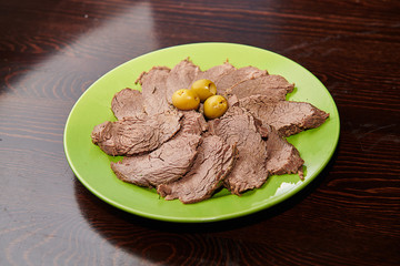 A dish of chopped pieces of boiled venison.