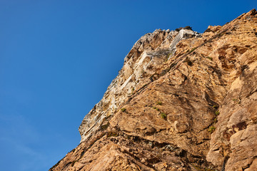 Fototapeta premium rocky mountains against the sky in sunny weather