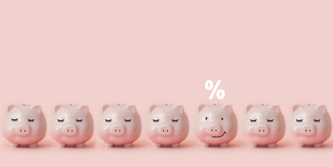 Smiling piggy bank with percent symbol stands next to six sleeping banks
