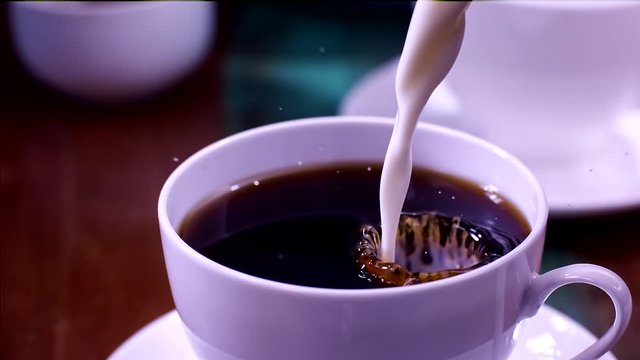 Pouring Milk in the Coffee Super Slow motion 1000fps
