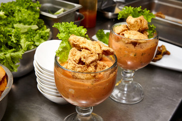 Peruvian cevichop with lettuce red pepper and fried seafood